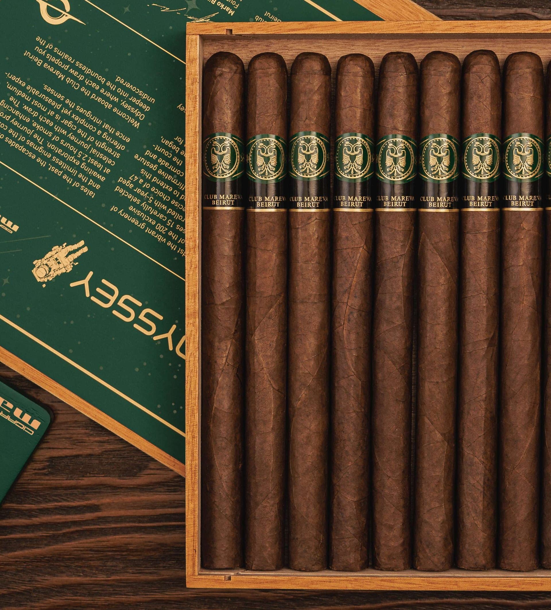 Odyssey cigars in their wooden box showing the dual-band design